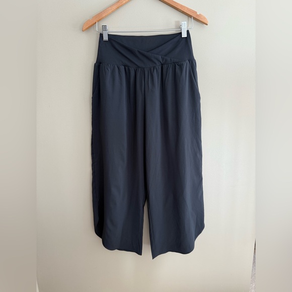 HALARA Black Cropped Pants with an Asymmetrical Bottom and Crisscross Front - Picture 7 of 17